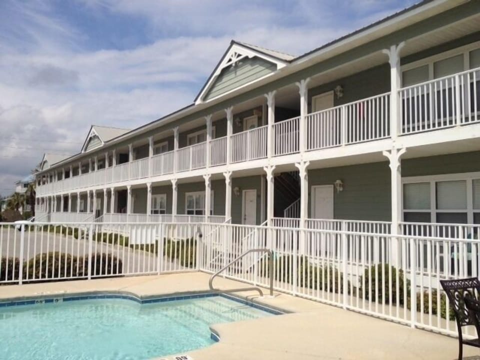  View of complex from pool. Pool checked and cleaned daily by maintenance.