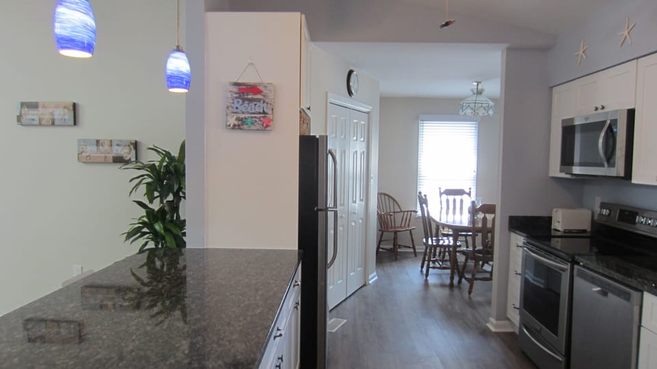 Dining Room and Laundry Area Off of Kitchen