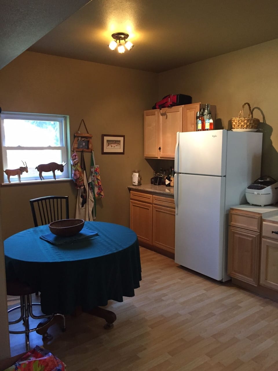 Second Fridge for Additional Storage and secondary dining table.