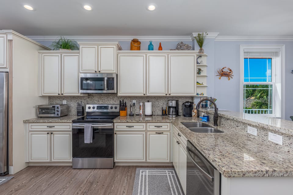 Fully stocked kitchen with almost anything you can think of for cooking.