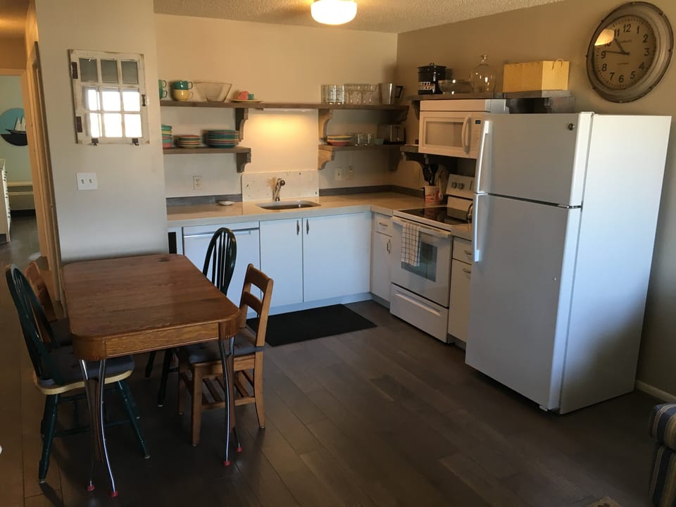 New dishwasher, sink, stove, microwave and frig