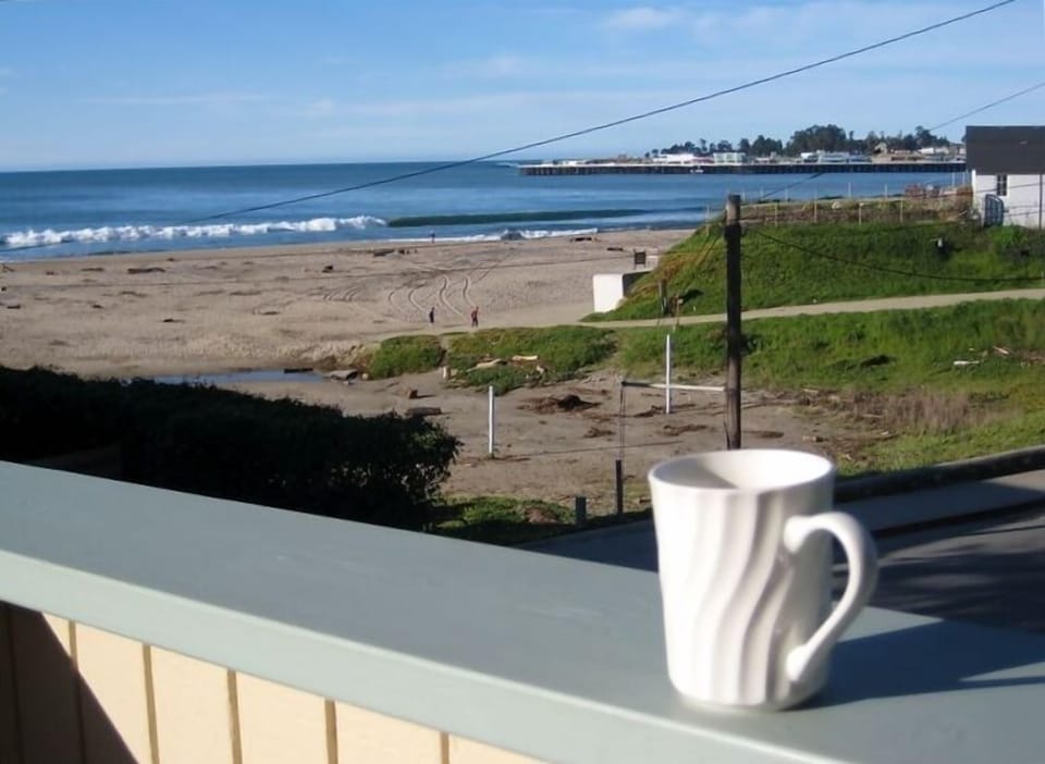 Having coffee on the deck while watching the kids