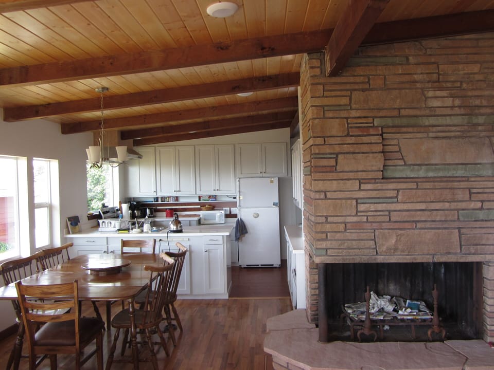 Kitchen, eating area and fireplace