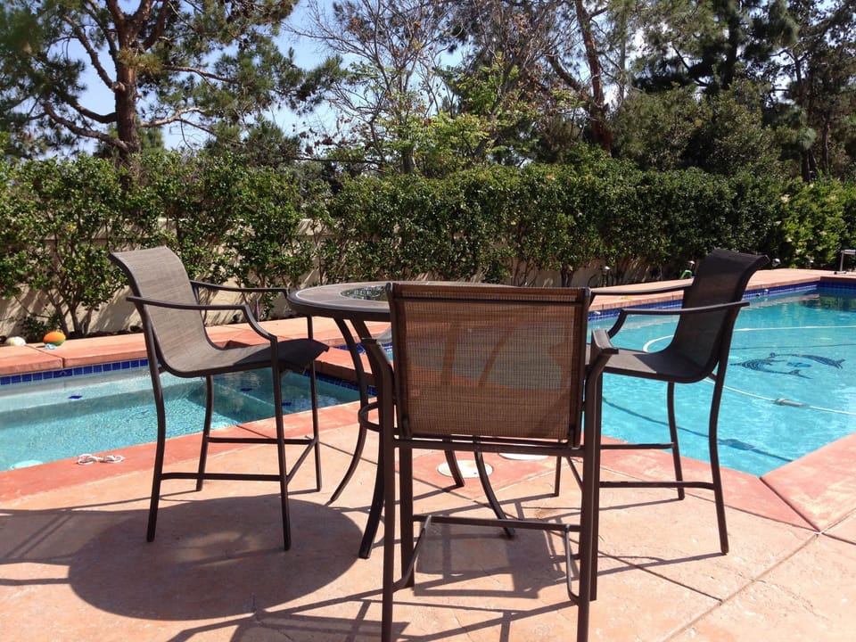 Outdoor seating area by the pool
