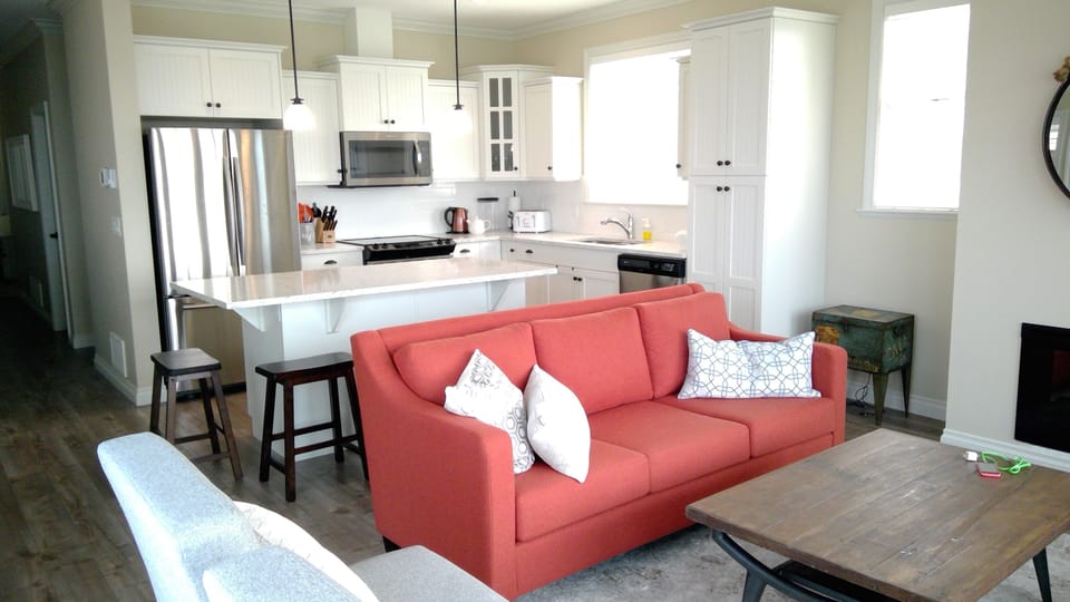 Kitchen island with plenty of space & spices to keep the chef happy.