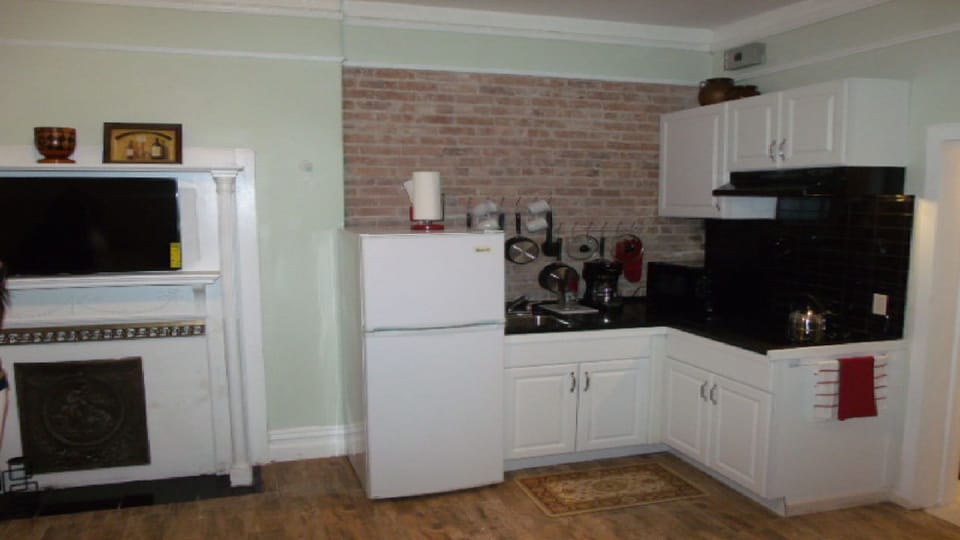 KITCHENETTE STOVE, MICROWAVE, TOASTER, UTENSILS, REFRIGERATOR,  