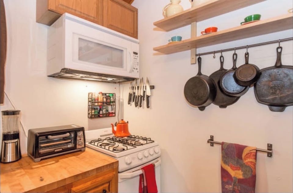 Vintage Castiron pans, toaster and toaster oven  and microwave