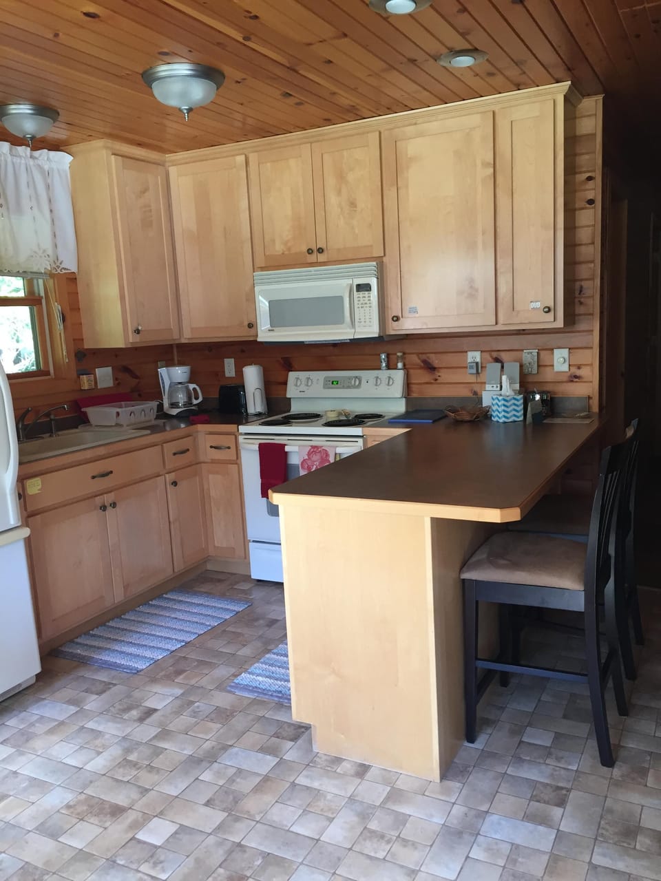 Stocked with cookware, Mr Coffee, toaster, dishes, spices, flour, sugar & more.