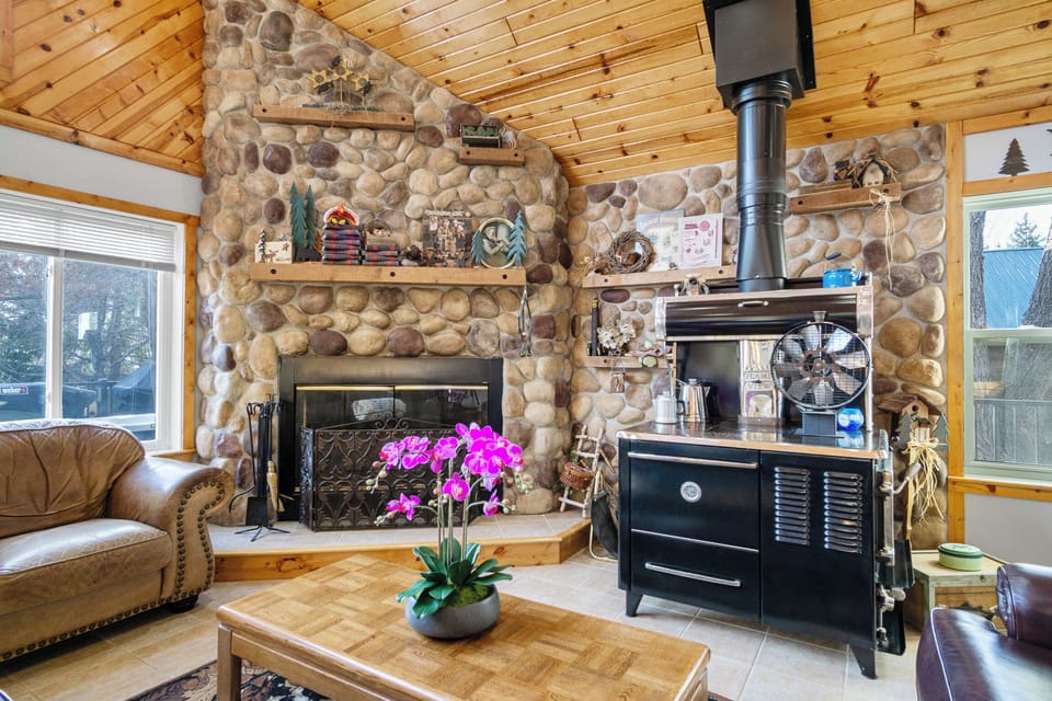 Warm, cozy and relaxing living room with  water views. Come and stay awhile!