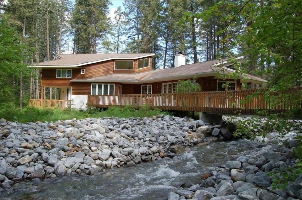 Cross the creek to this wonderful mountain home.