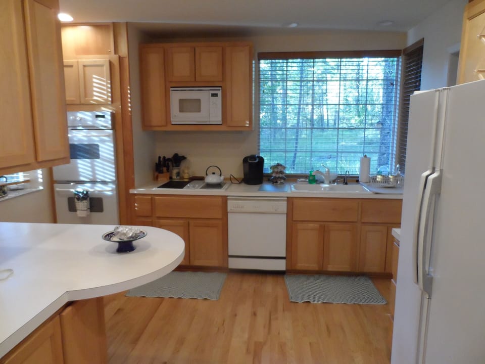 Cook's kitchen with fabulous views of the natural surroundings.