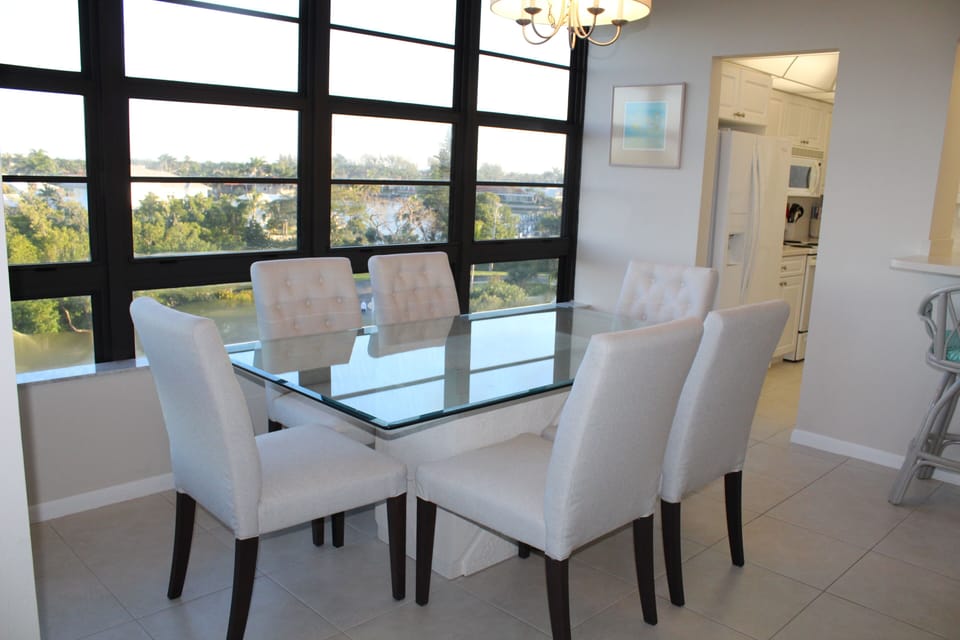 Large dining room with plenty of room for six at the table.