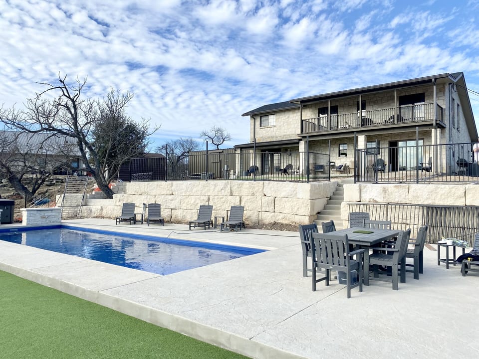 Back yard dream! Pool w/splash ledge, bocce ball court and turf play yard!