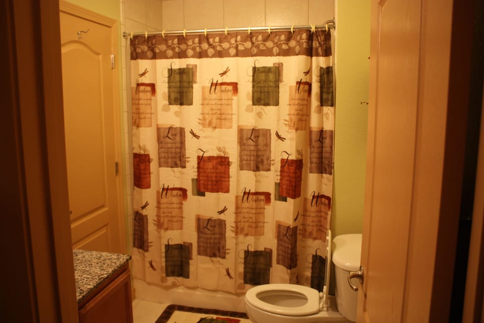 Guest Bathroom that opens to the second bedroom and living area