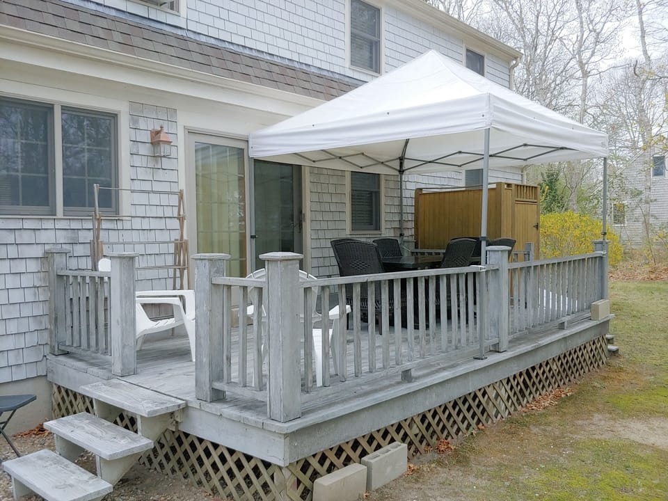 Covered outdoor dining area, and outdoor shower.