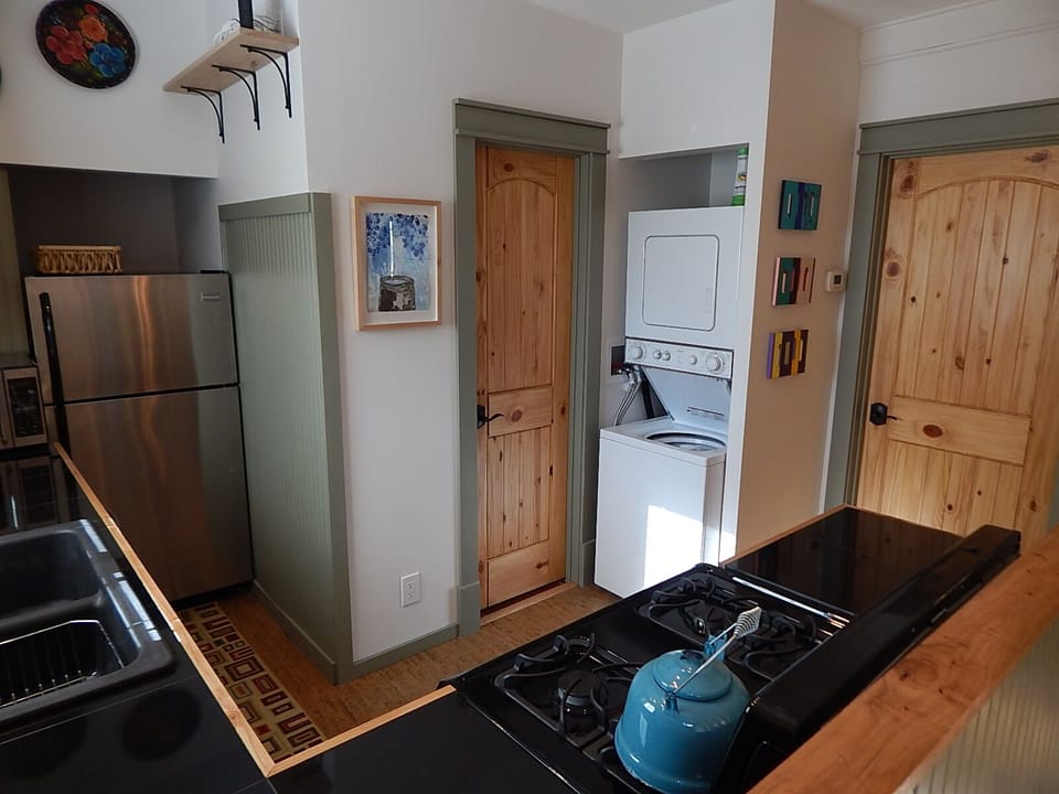 View of Kitchen area and
washer and dryer. 