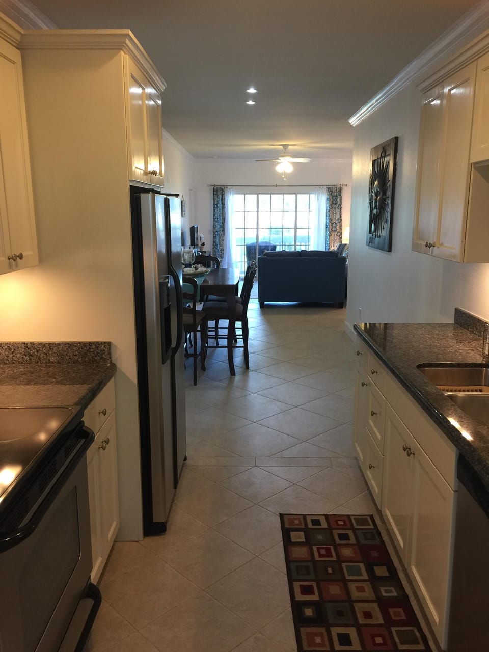 view of dining and  living rooms from kitchen