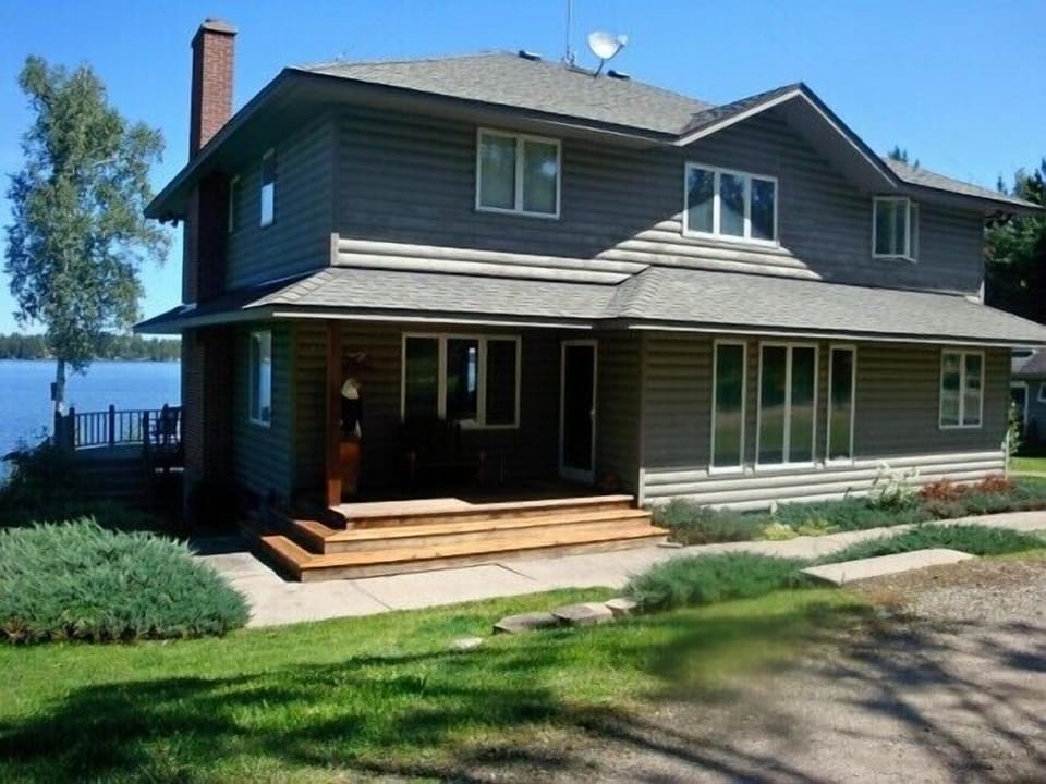 Photo of the back of the home when you drive into driveway