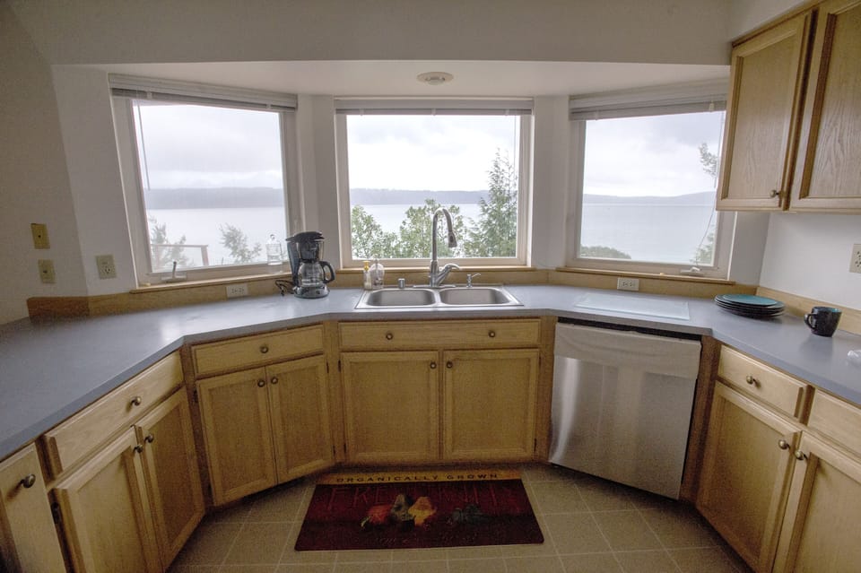 Admire water view while cooking.