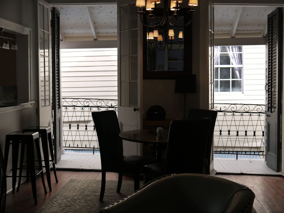 DINING ROOM WITH DOORS TO BALCONY