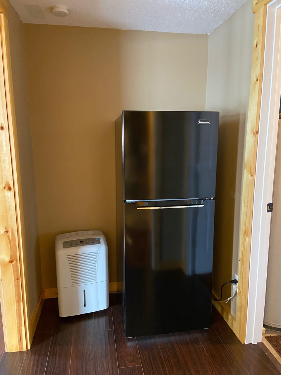 Extra refrigerator on the lower level. 