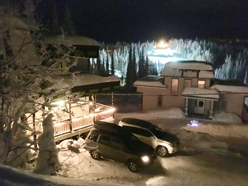 View looking out toward the Silver Queen chair at night