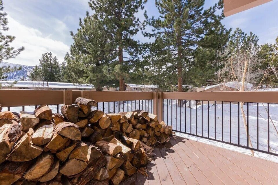 Large deck with mountain views.  This deck opens up onto the center of the complex which is park like.  No cars, in the summer it is a giant lawn and in the winter it is snow play all day.