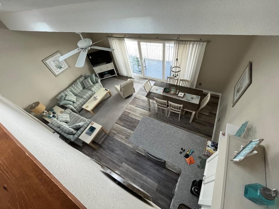 View of Living Room and Dining Area from Loft