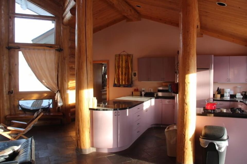 Open, fully stocked kitchen with ample counter space