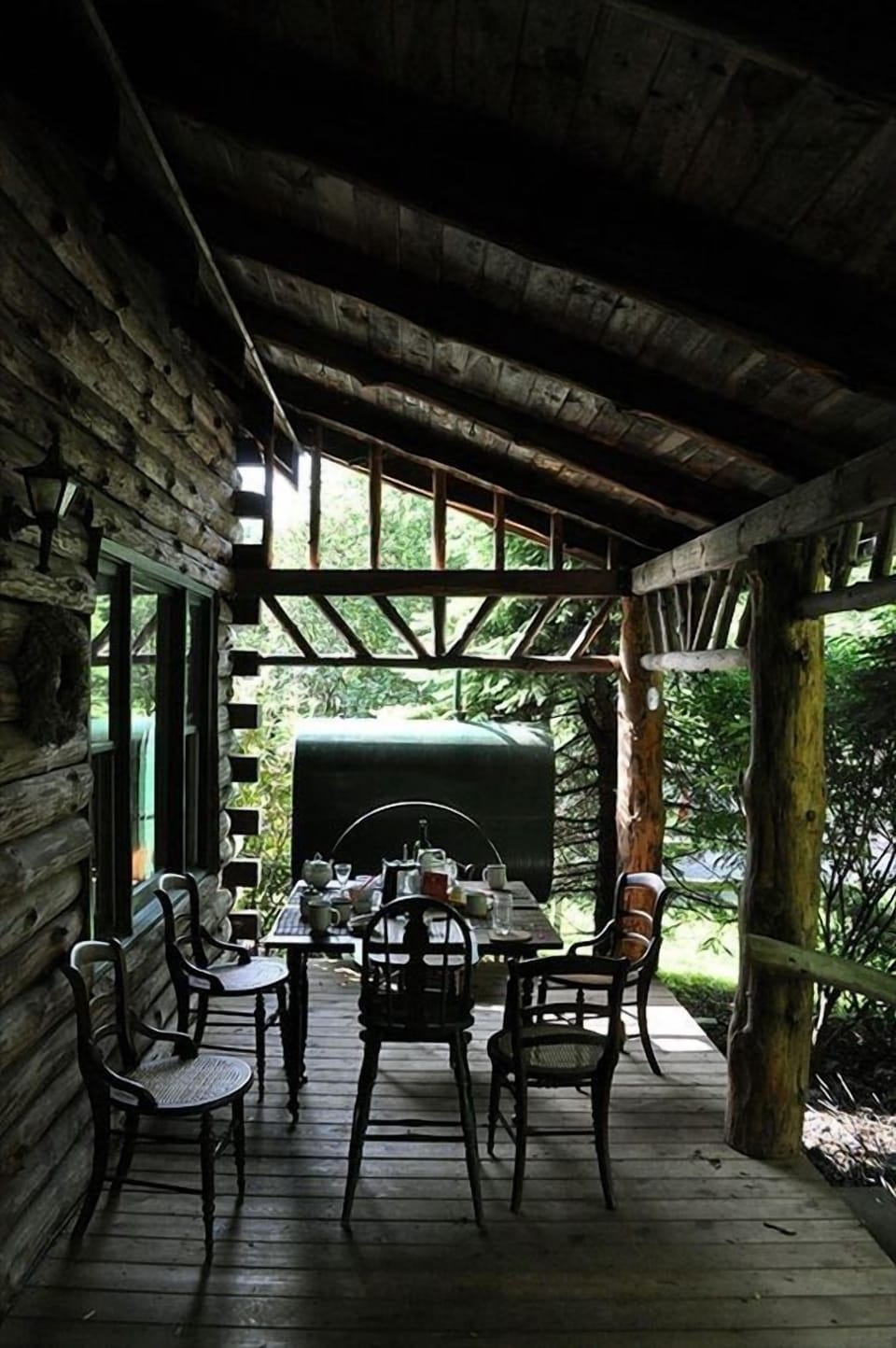 Enjoy meals in the shade of the front porch just off the kitchen