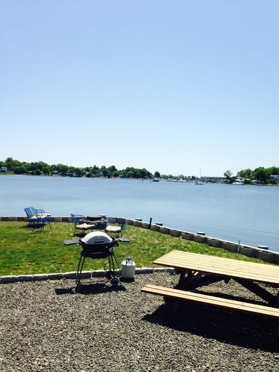 Picnic area with fire pit in background 