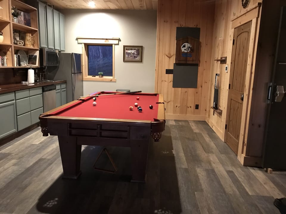 Downstairs game room with kitchenette 
