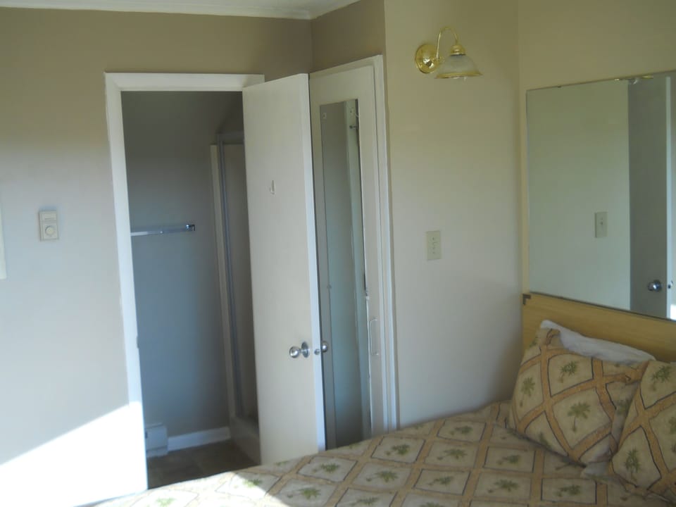 Bedroom 2 with small bath and balcony access