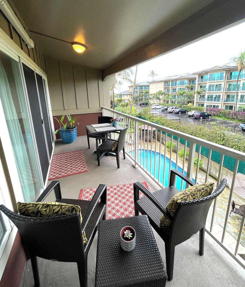 Lanai (balcony) view toward ocean and garden pool 