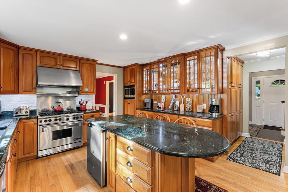 Large, well appointed kitchen.  Wolf Oven. 