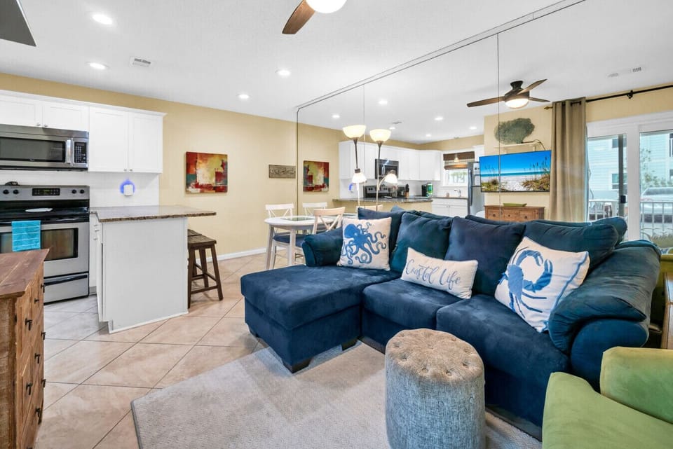 Endless Summer offers open living with large, cozy couch