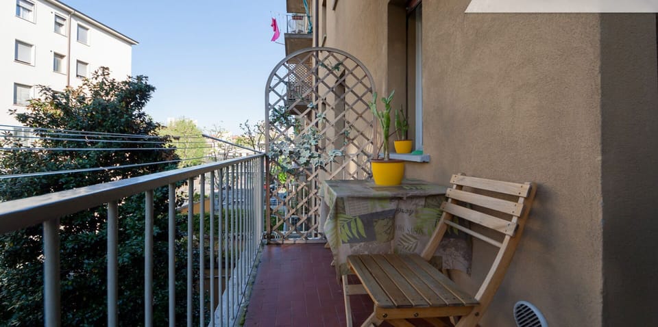 Balcony outside the kitchen, with table and chairs