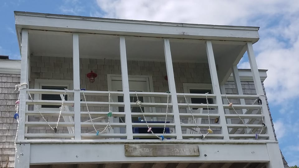 Upstairs deck decorated with one of our favorite beach finds from the Bahamas
