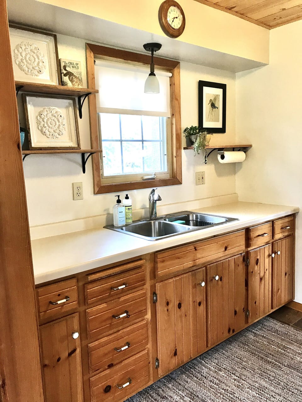 Clean open kitchen window facing canal and lake