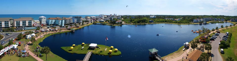 Walk to Carolina Beach Lake for Paddle Boats, Farmers Market, movies, festivals