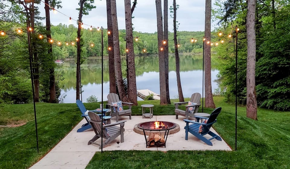 Enjoy the firepit with string lights and gorgeous views of the lake!