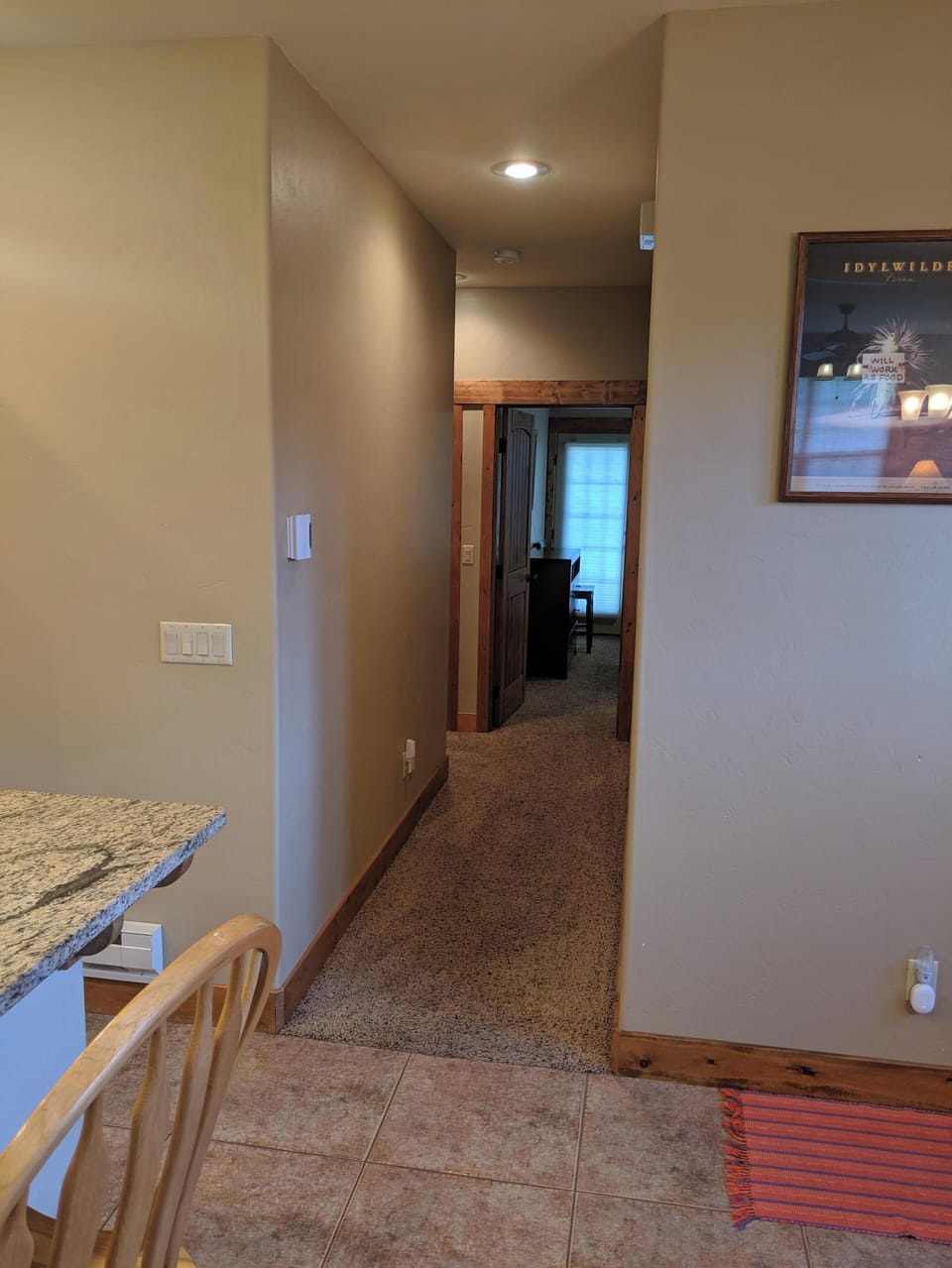 Hallway to queen and twin bedrooms, bathroom