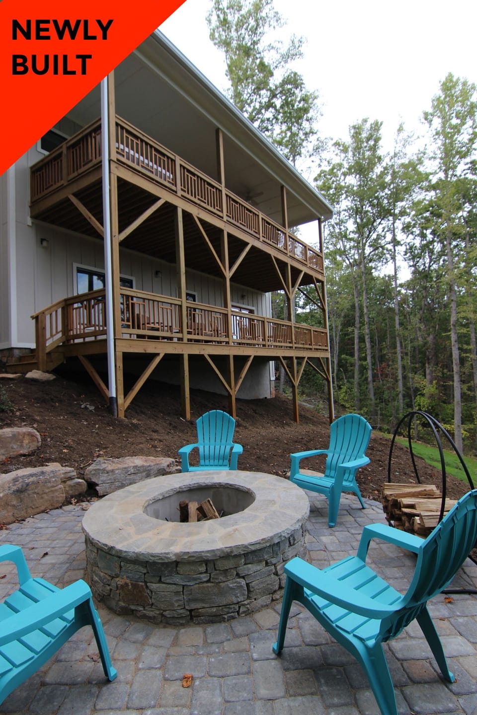 a view of the two decks and fire pit