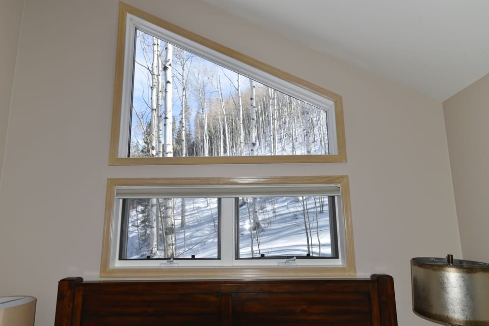 Window above bed in master