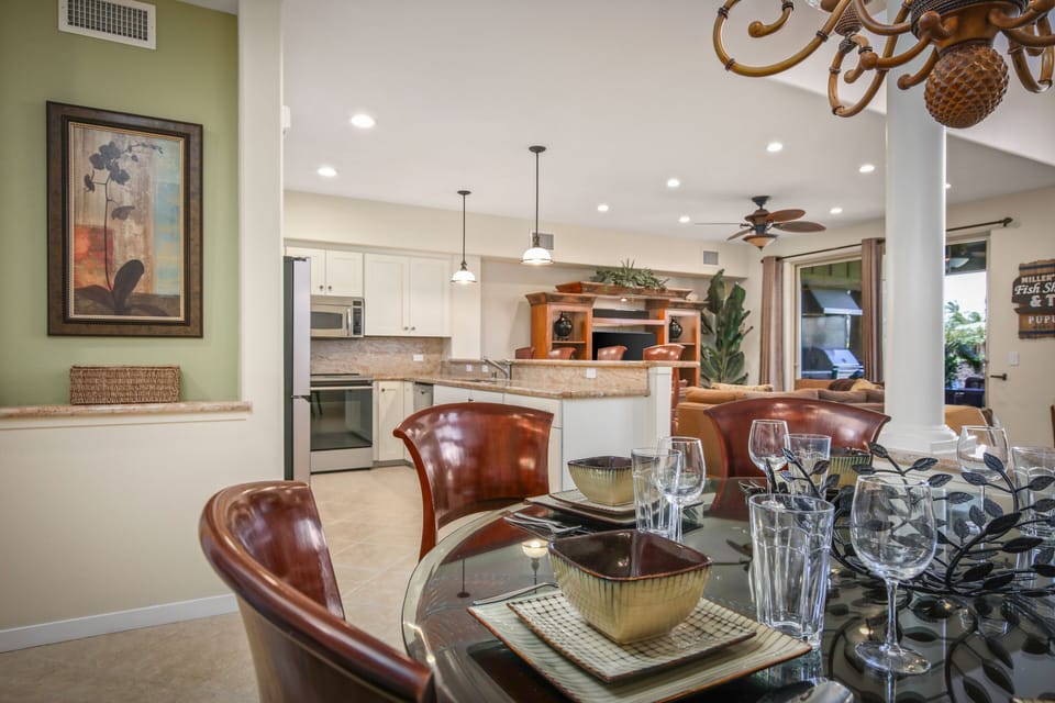 Dining Room with Kitchen and Family Room beyond.
