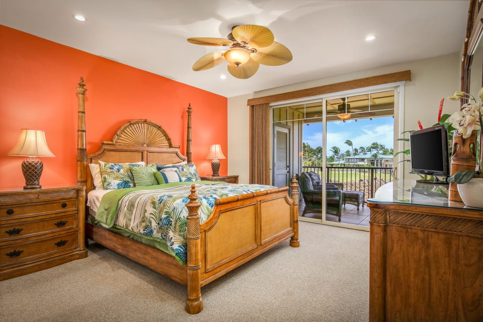 Owners suite decorated in Tommy Bahama with art by Heather Brown