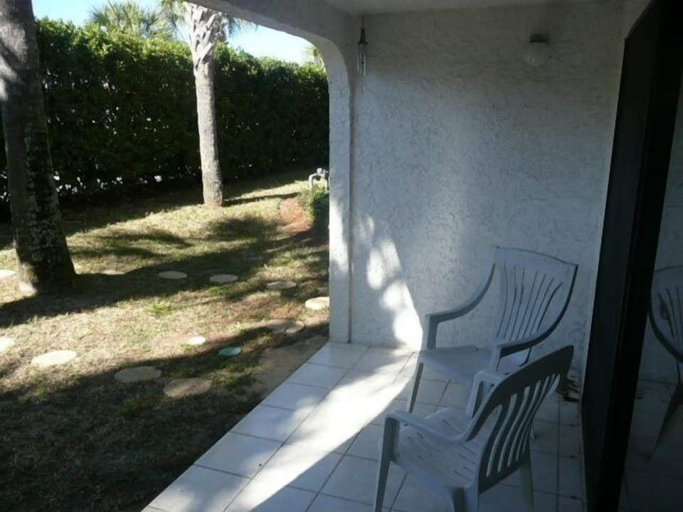 Outside back porch...grassy area...great for outdoor games right at the condo
