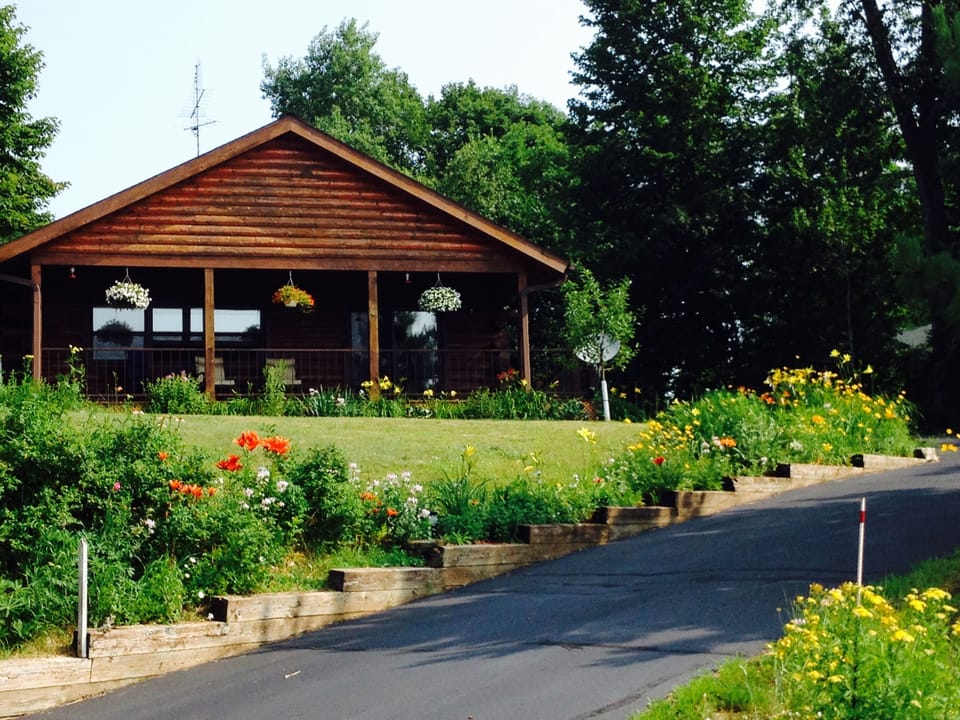 Front of house showing driveway and covered  porch