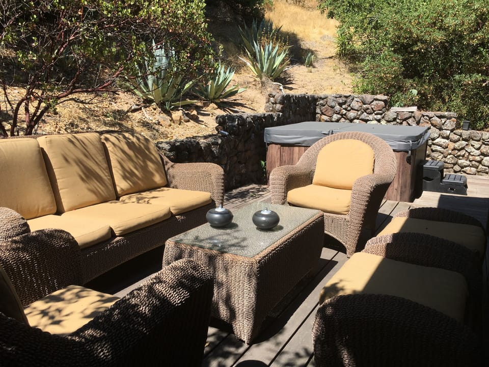 Outdoor seating area/hot tub off main house 