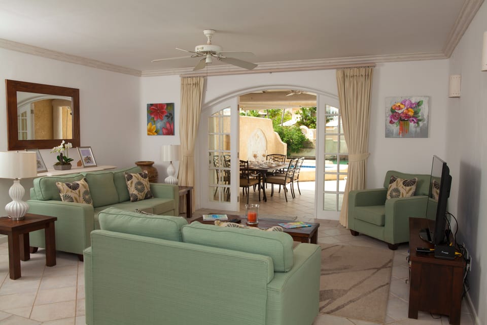 The spacious living area is perfect for lounging. Enjoy WiFi throughout the home